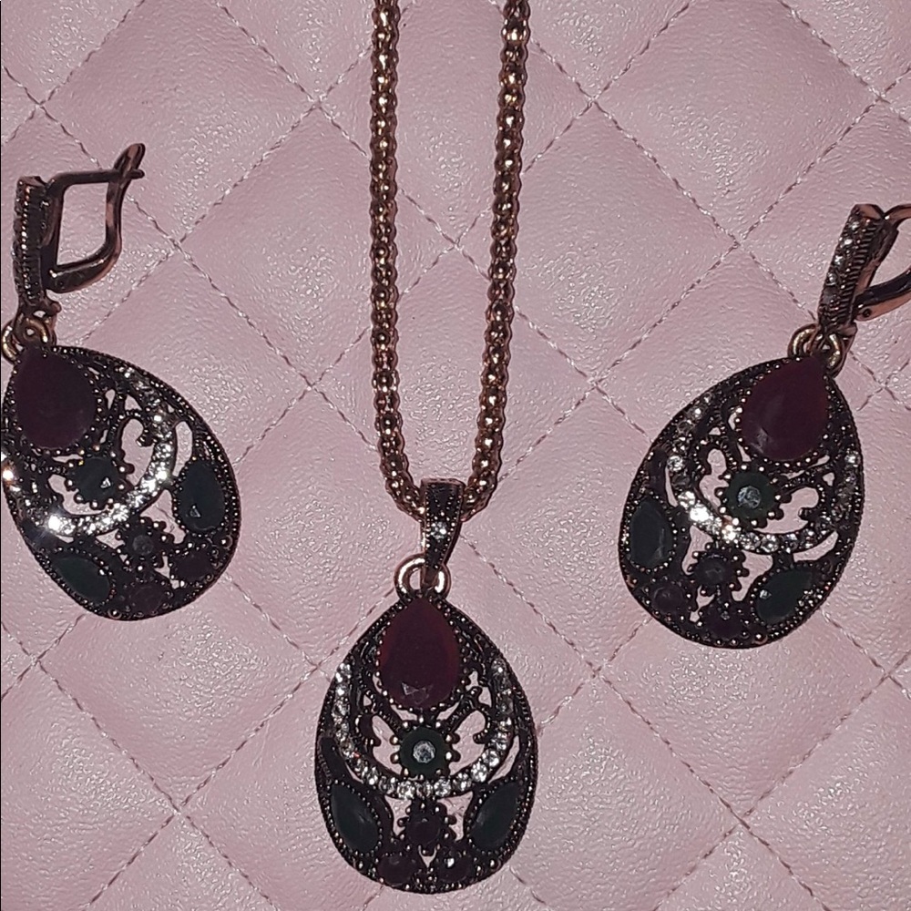 Matching necklace and earrings set.